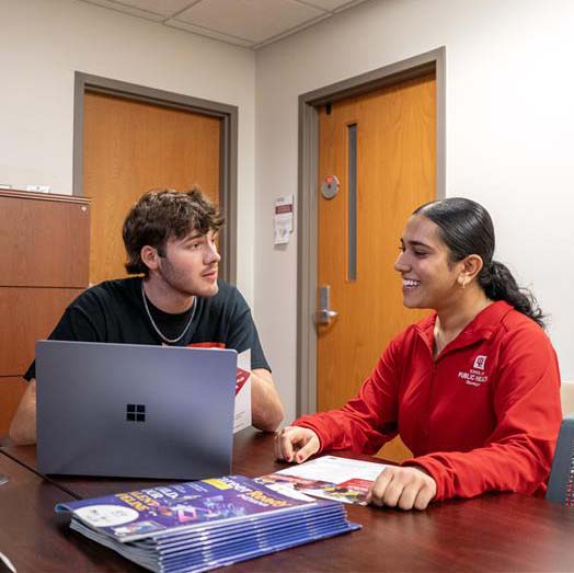 advisor with student