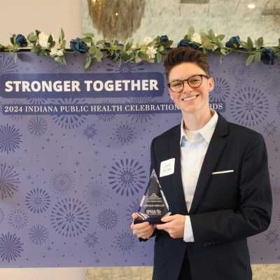 Dr. Jordan McIntire with her award