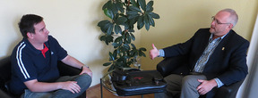 Doctor Pedersen being interviewed by reporter in Hungary image.