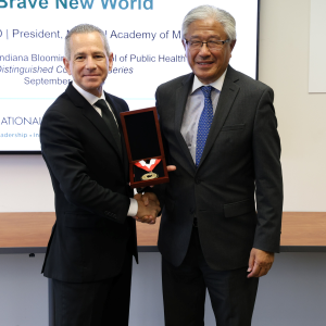 Dean David B. Allison (L) presents the Dean's Medallion to Victor Dzau, M.D.